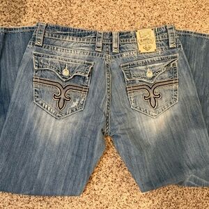 Men's Rock Revival Blue Jeans with Embroidered Pockets